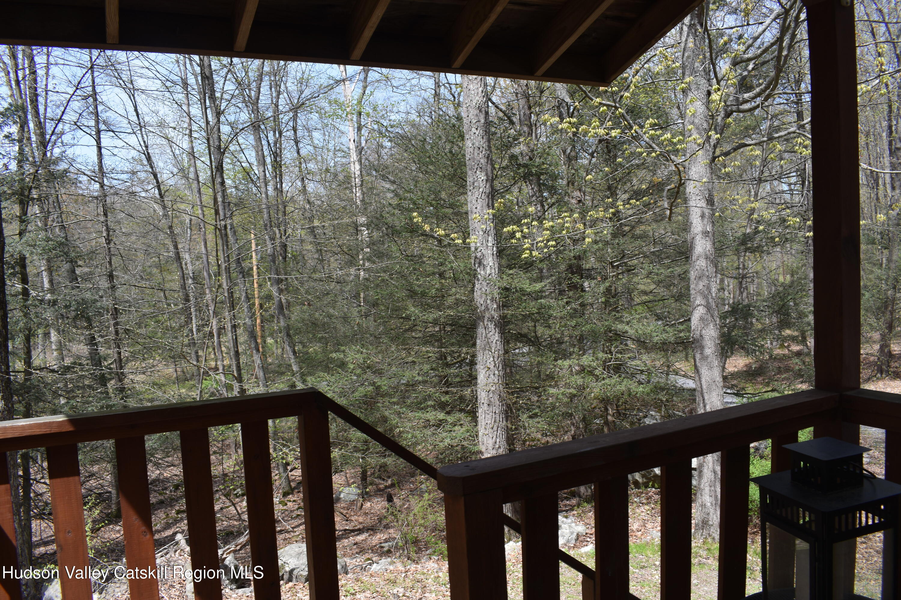 125 Hardenburgh Road Ulster Park, NY 12487 - Photo 44 of 45 a view of a balcony with wooden floor and fence