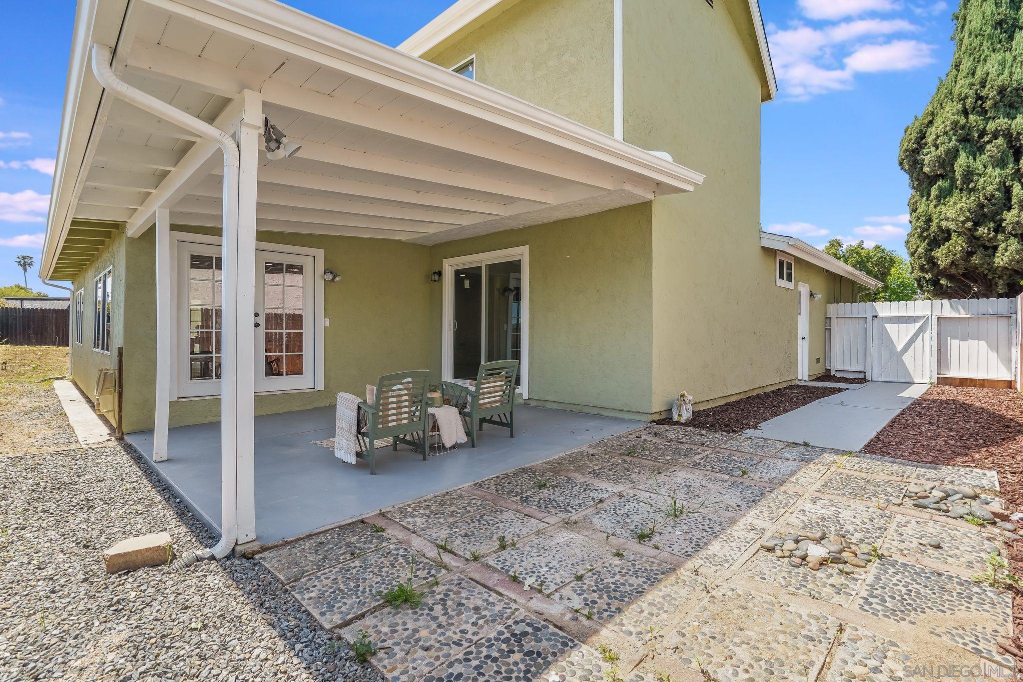 3350 Watercrest Court Bonita, CA 91902 - Photo 25 of 27 a view of a livingroom with furniture and floor to ceiling window