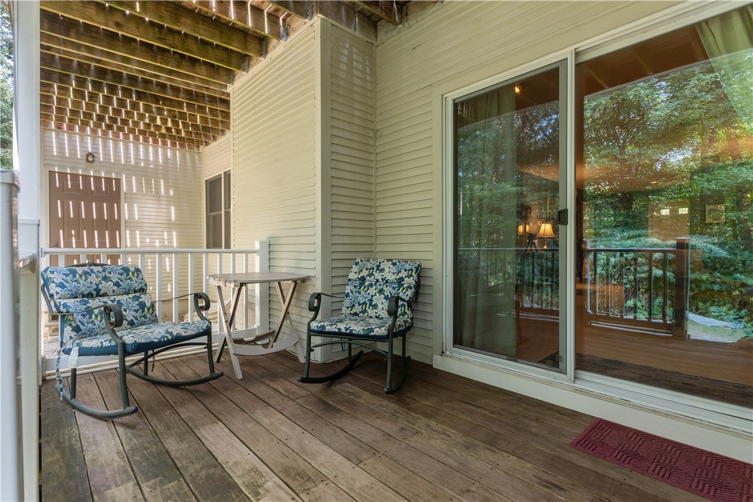 72 Trellis Drive West Warwick, RI 02893 - Photo 22 of 26 Enjoy your view of the woods on this nice, private, mahogany deck@