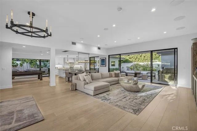 a outdoor space with patio couch and wooden floor