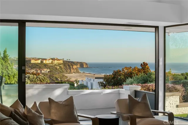 a view of a back yard from a balcony