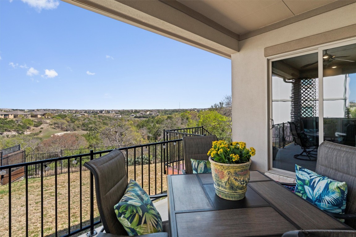 1904 Mazarro Drive Leander, TX 78641 - Photo 1 of 1 a view of a balcony with chairs and a potted plant