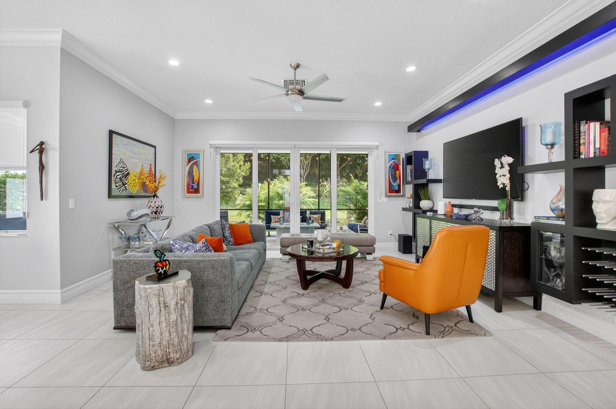 8263 Arabian Range Road Boynton Beach, FL 33473 - Photo 14 of 52 a living room with furniture and a flat screen tv