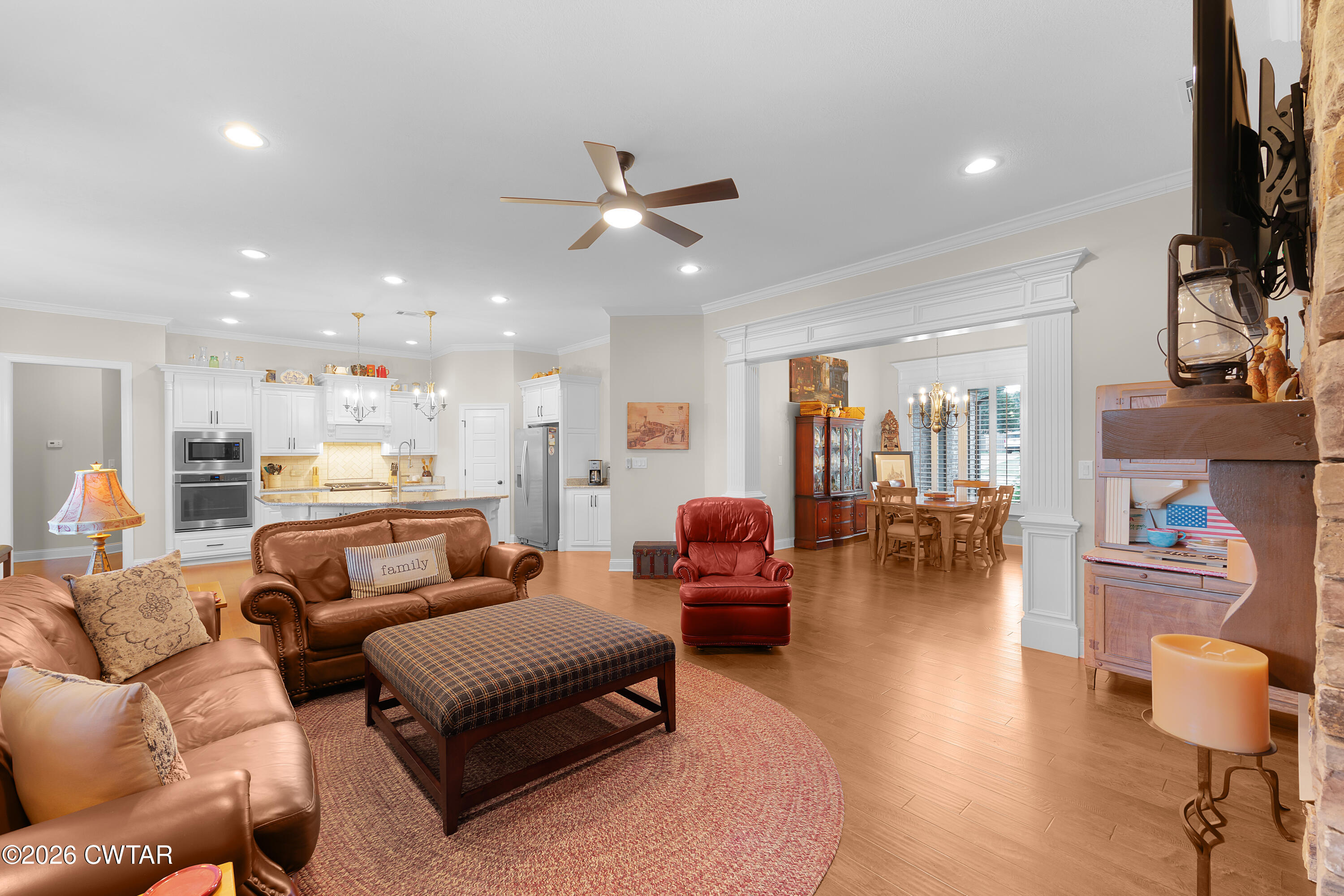 34 Cheddleton Cove Jackson, TN 38305 - Photo 6 of 32 a living room with furniture and a flat screen tv
