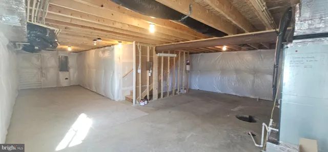 a view of a room with wooden walls