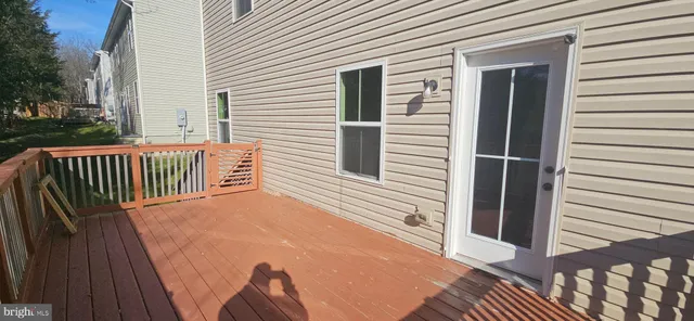 a view of a balcony with furniture