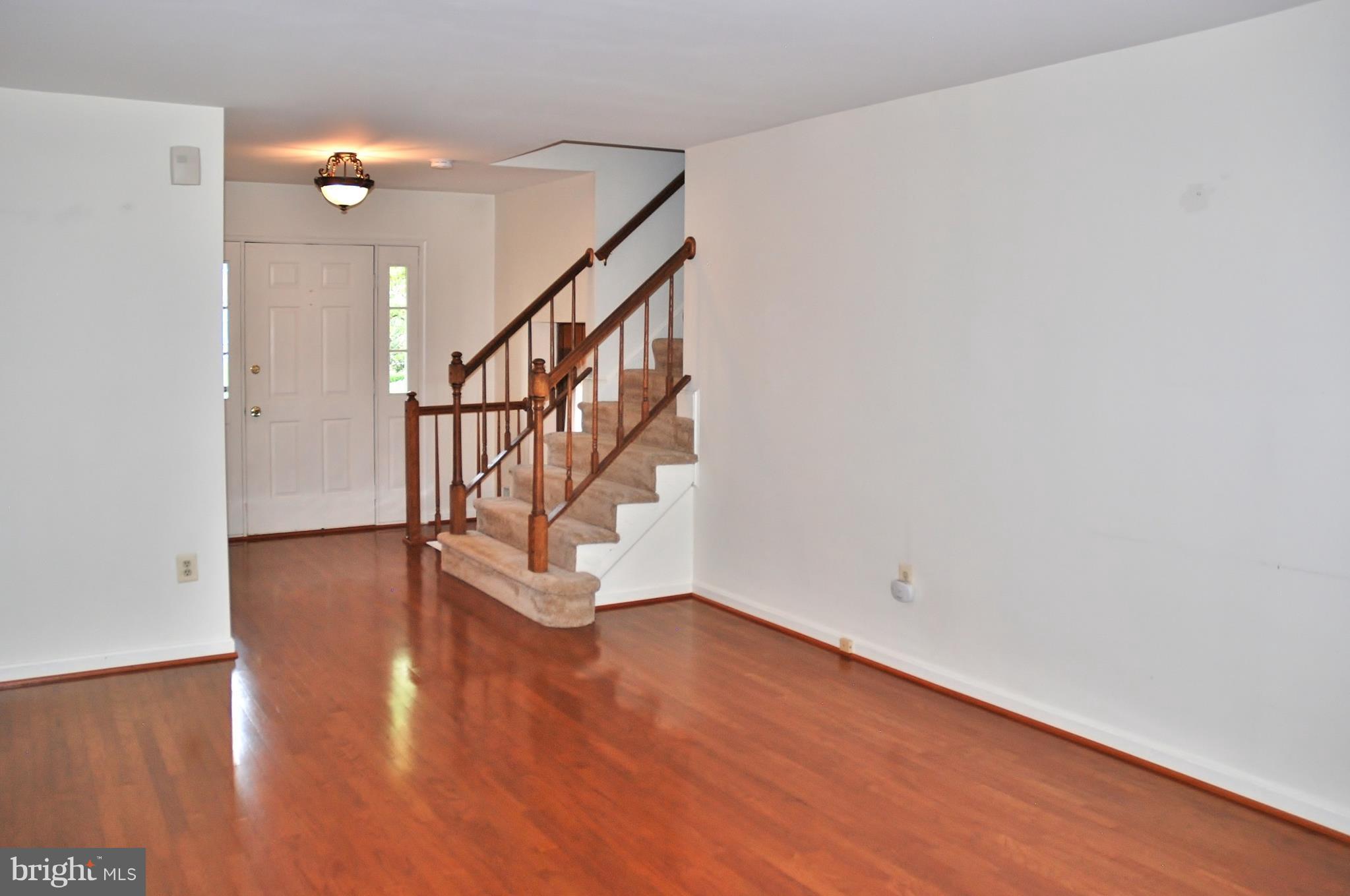 14409 Culp Court Silver Spring, MD 20905 - Photo 3 of 29 Welcoming Open Foyer with Hardwood Floors