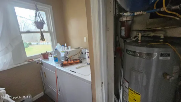 a storage room with washer and dryer