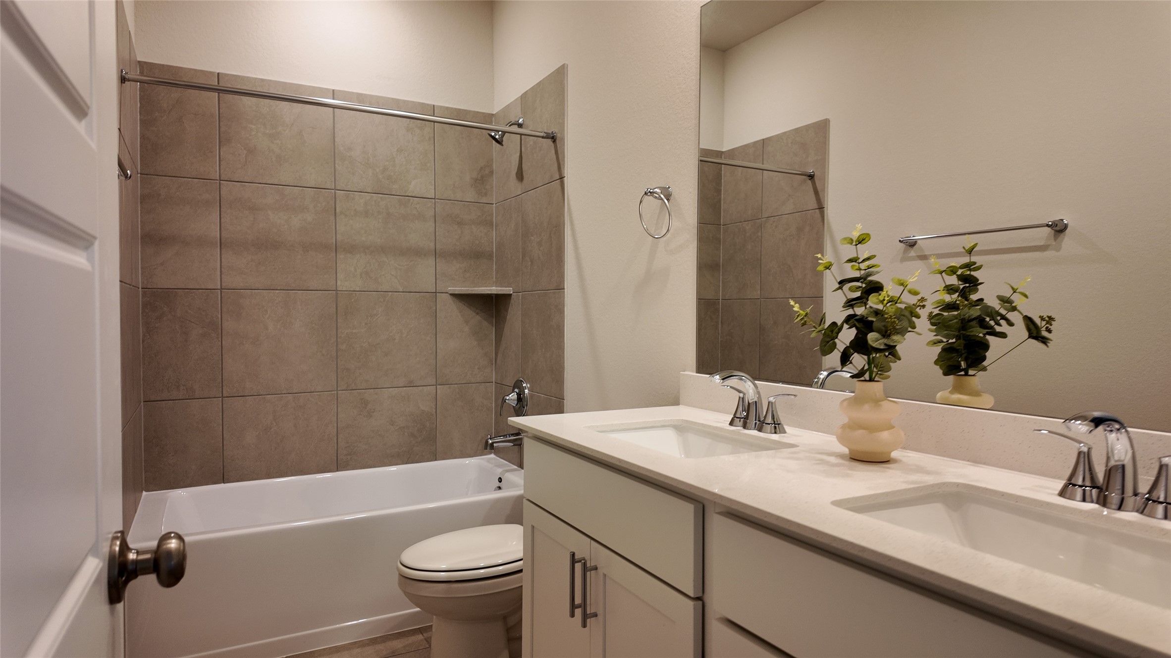 16241 Parish Pointe Court Conroe, TX 77302 - Photo 17 of 25 a bathroom with a sink a toilet and shower