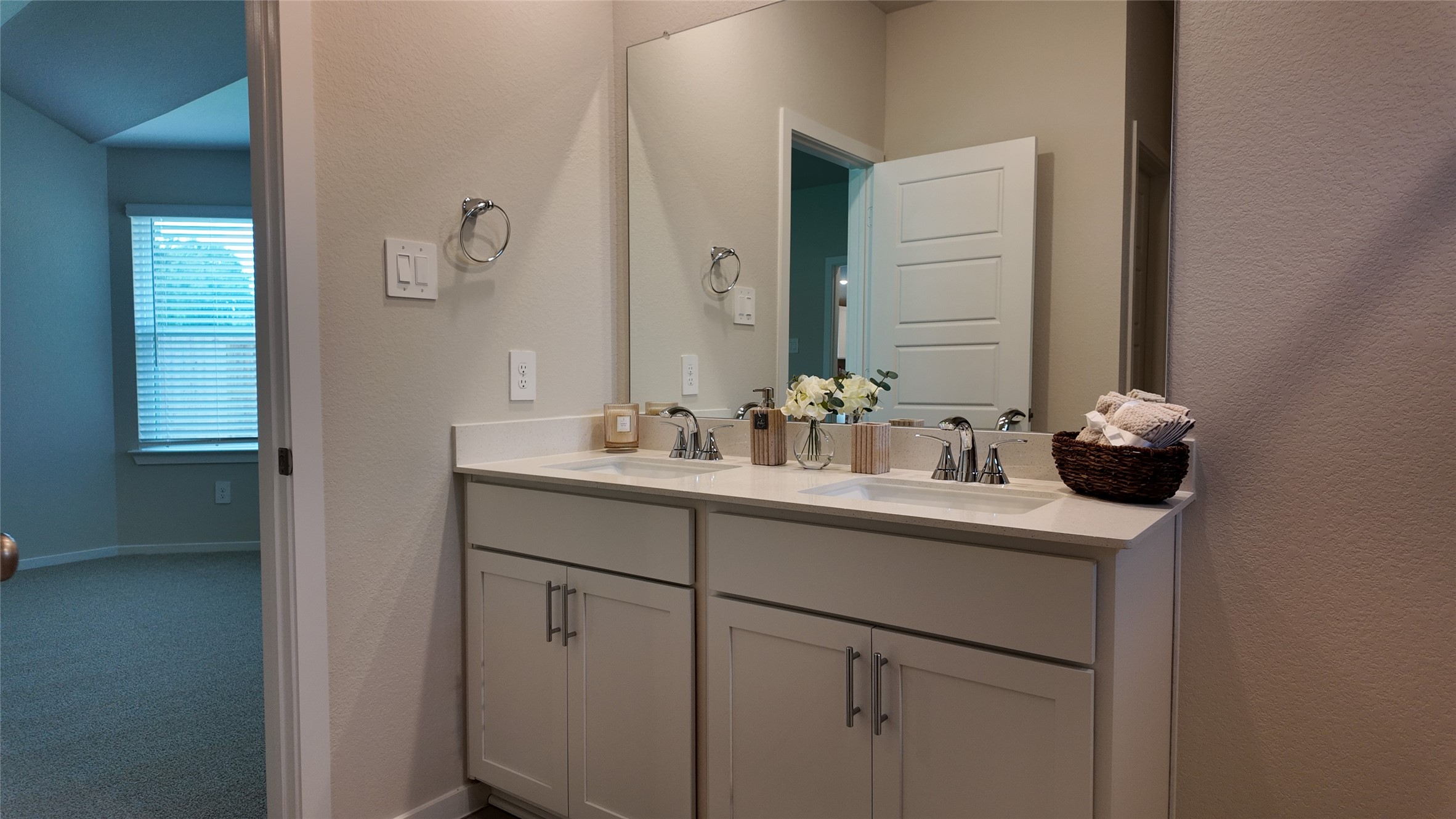 16241 Parish Pointe Court Conroe, TX 77302 - Photo 22 of 25 a bathroom with a sink and a mirror