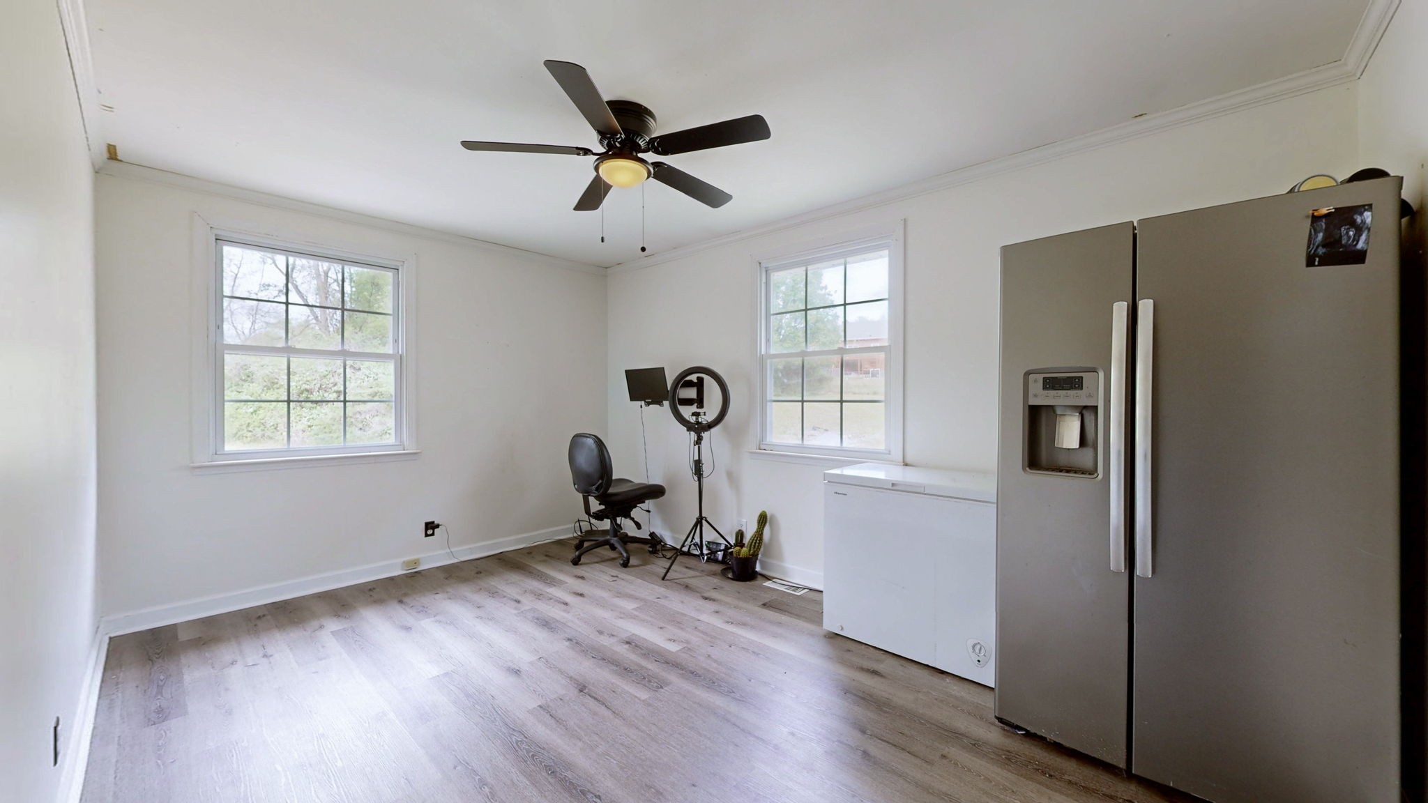 463 Walton Ferry Road Hendersonville, TN 37075 - Photo 27 of 54 a view of a room with wooden floor a ceiling fan and windows