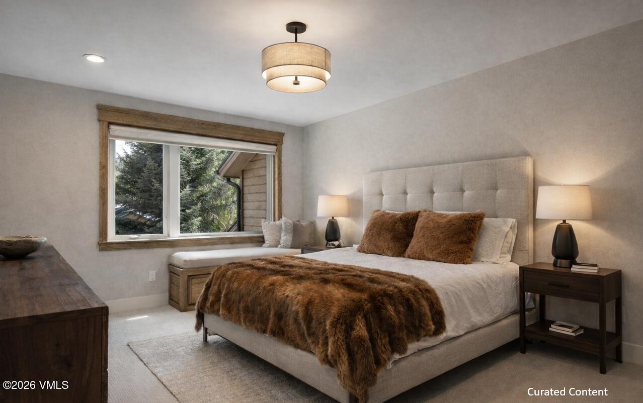 50 Hereford Road Edwards, CO 81632 - Photo 13 of 36 a bedroom with a bed and window