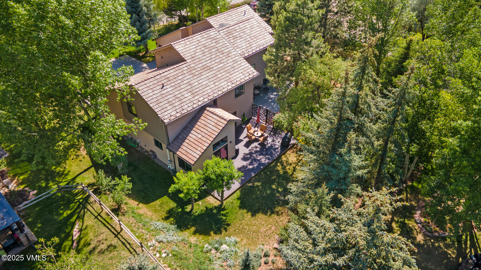 50 Hereford Road Edwards, CO 81632 - Photo 26 of 36 a view of a house with a yard and sitting area