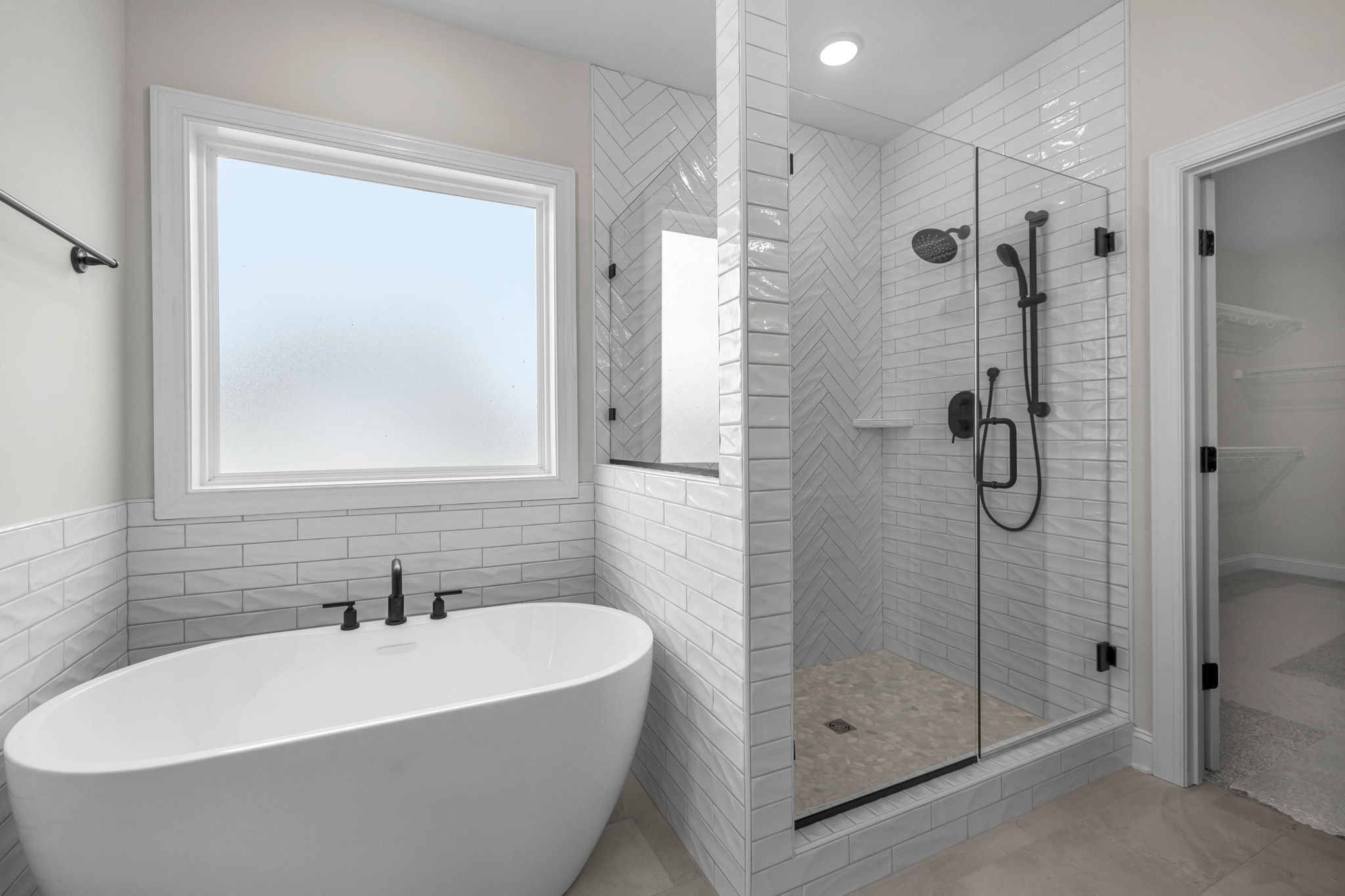 8708 Newtown Road Rockvale, TN 37153 - Photo 24 of 50 a white bath tub sitting next to a shower