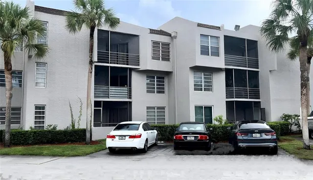 a car parked in front of a house