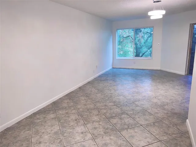 a bathroom with a sink a mirror and a shower