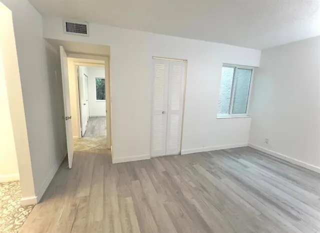 a bathroom with a sink a vanity and a mirror