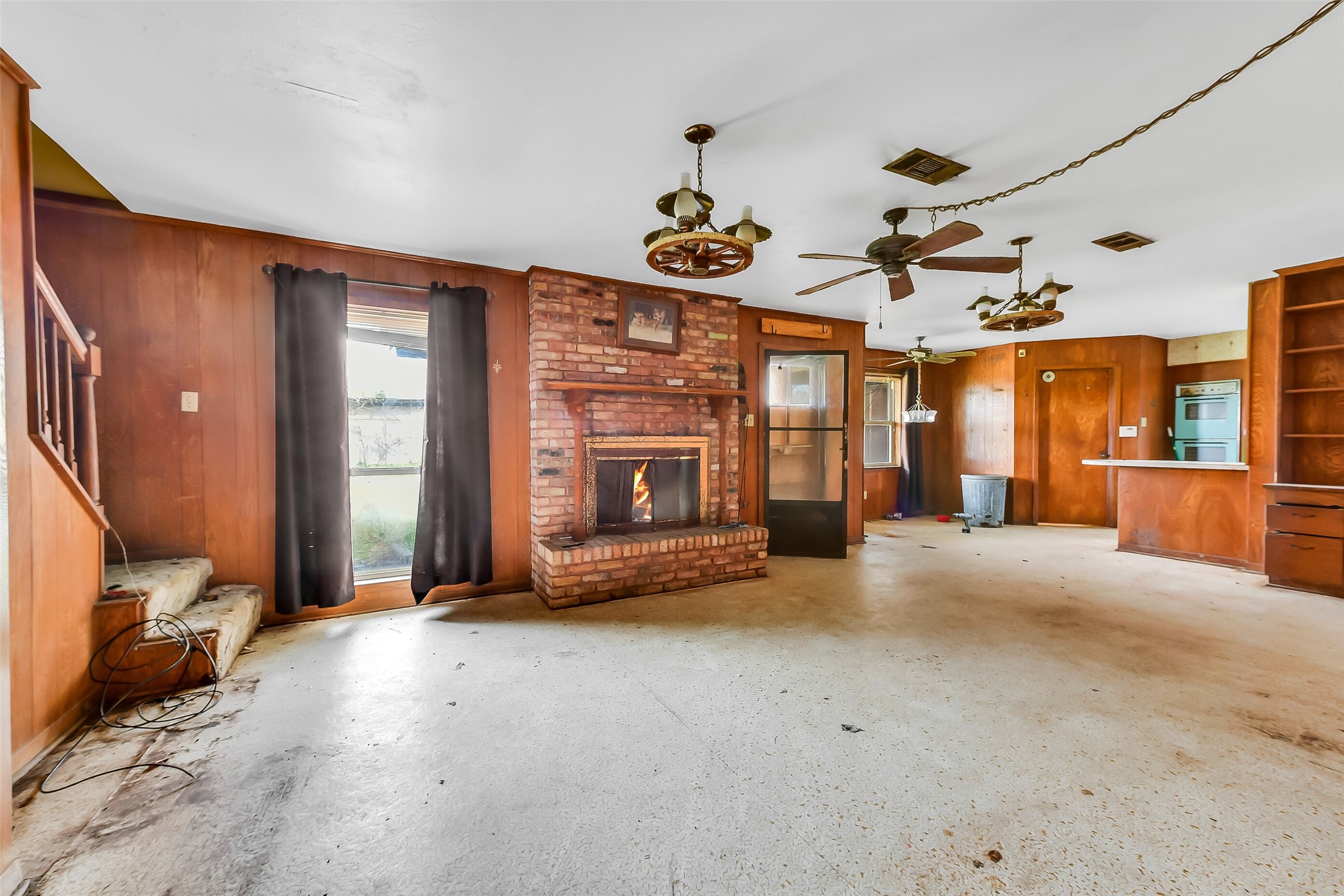 4918 Farmer Road Alvin, TX 77511 - Photo 12 of 18 a view of a livingroom with a fireplace