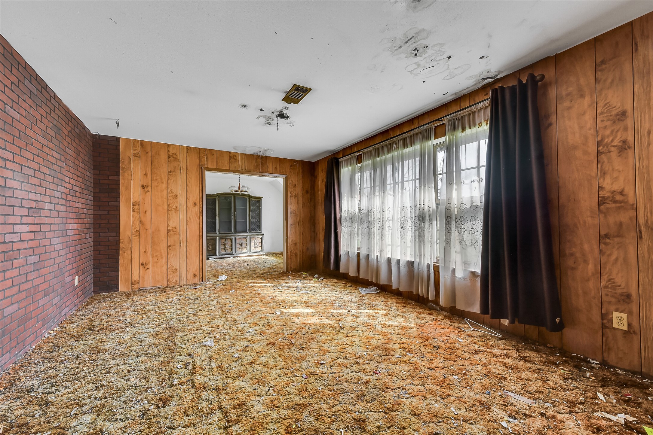 4918 Farmer Road Alvin, TX 77511 - Photo 15 of 18 a view of an empty room with a window