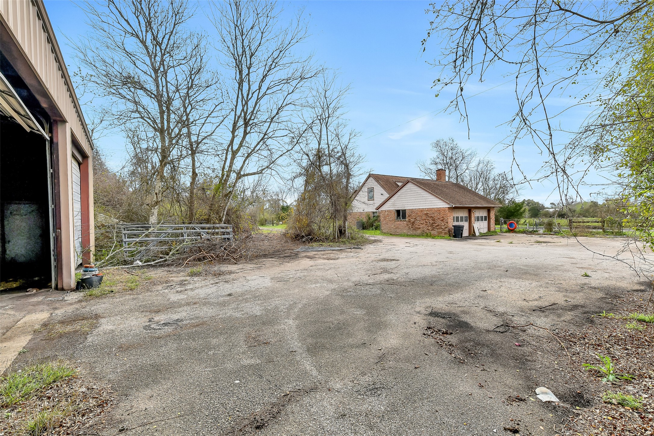 4918 Farmer Road Alvin, TX 77511 - Photo 9 of 18 a view of house with a street