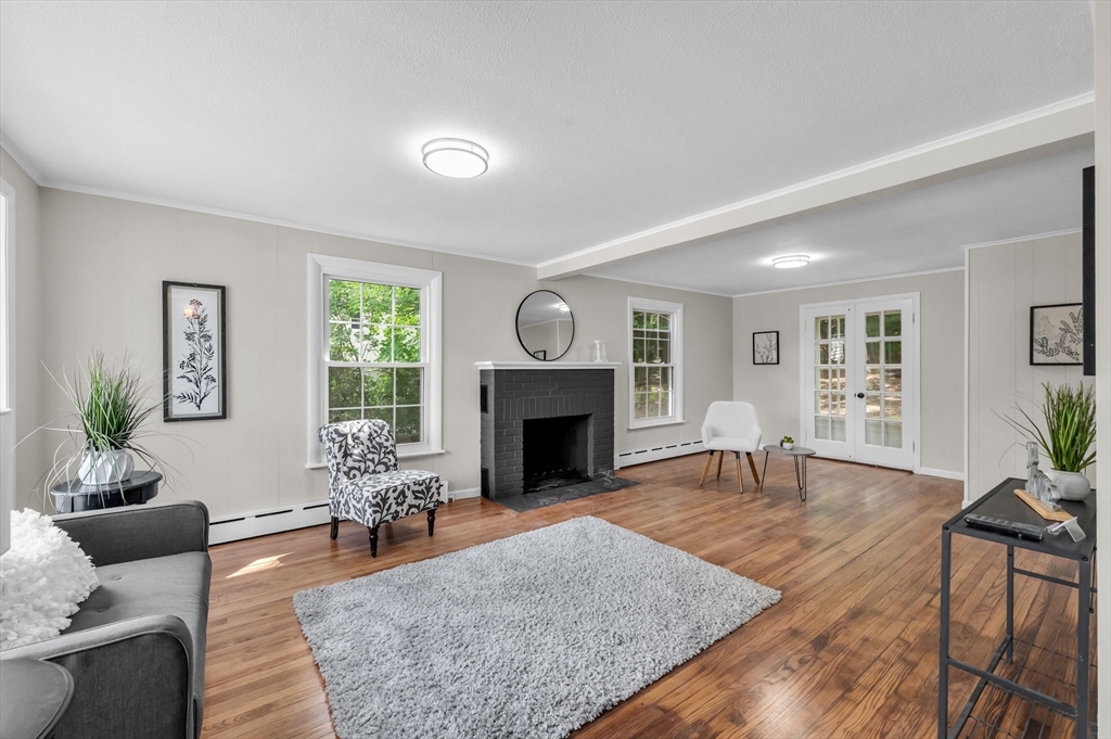 37 Bridge Street Monson, MA 01057 - Photo 26 of 35 a living room with furniture and a fireplace