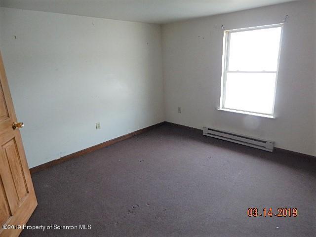 1763 Ridge Road Montrose, PA 18801 - Photo 17 of 26 an empty room with a window