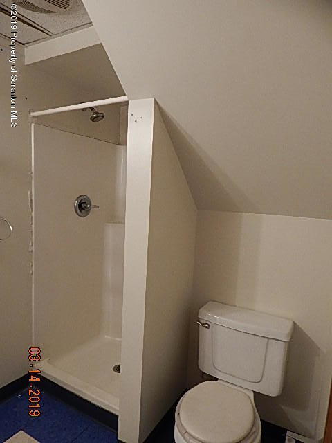 1763 Ridge Road Montrose, PA 18801 - Photo 20 of 26 a bathroom with a toilet and a shower