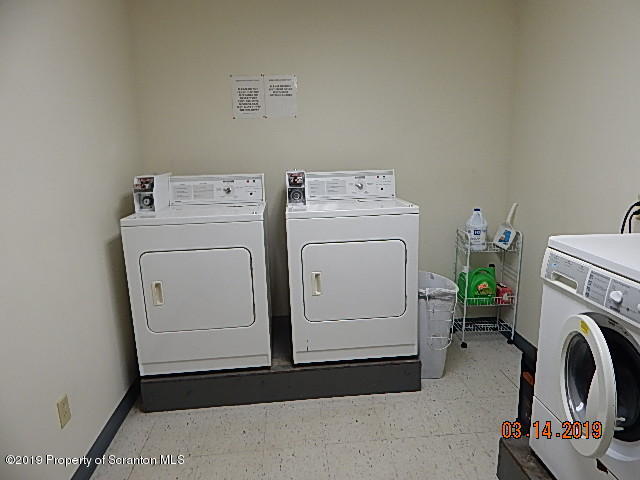 1763 Ridge Road Montrose, PA 18801 - Photo 22 of 26 a utility room with dryer and washer