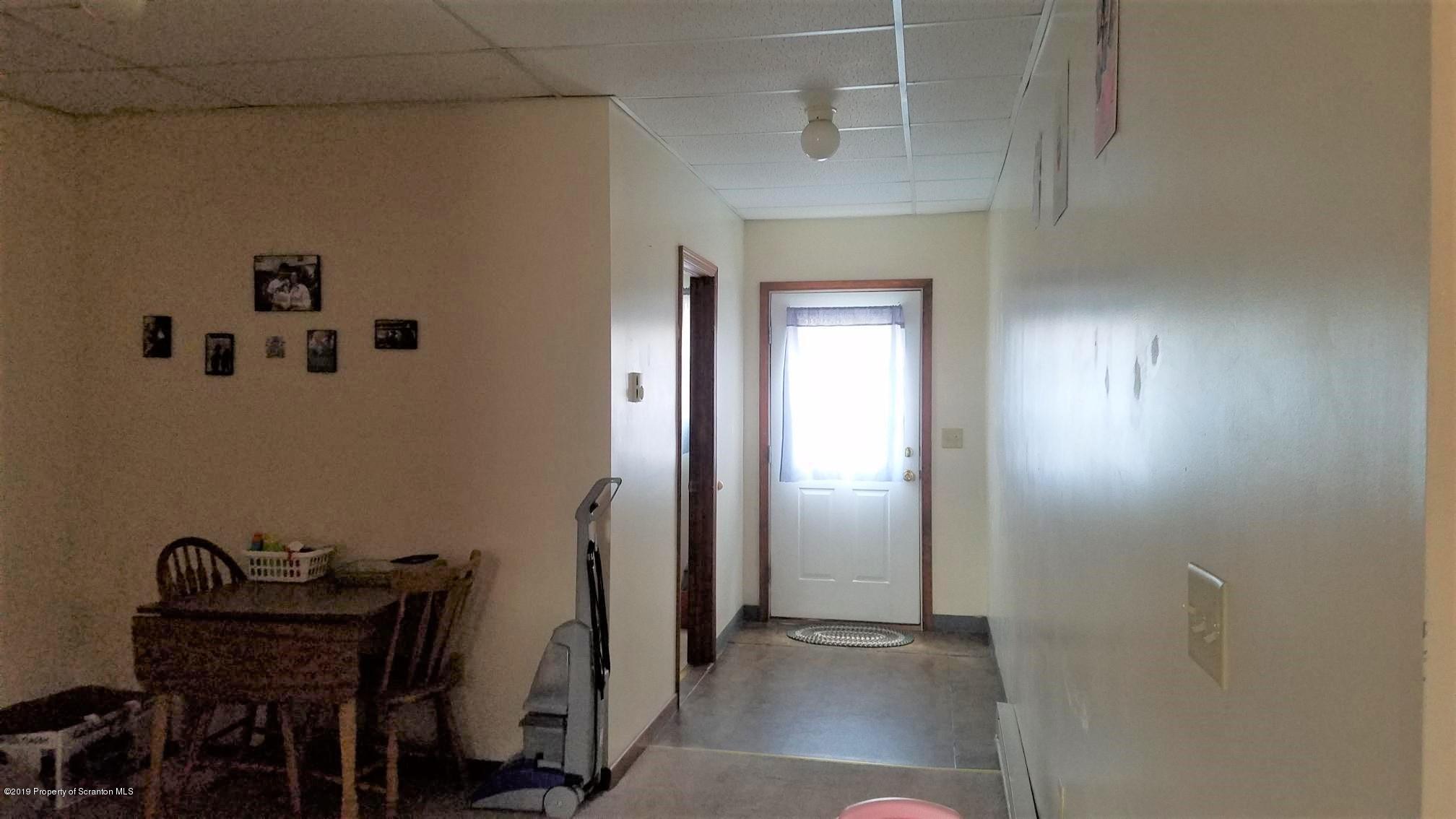 1763 Ridge Road Montrose, PA 18801 - Photo 10 of 26 a view of a hallway with workspace