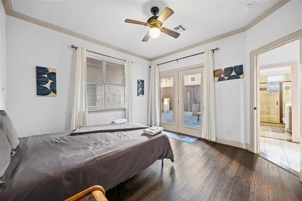 a living room with furniture wooden floor and next to a window