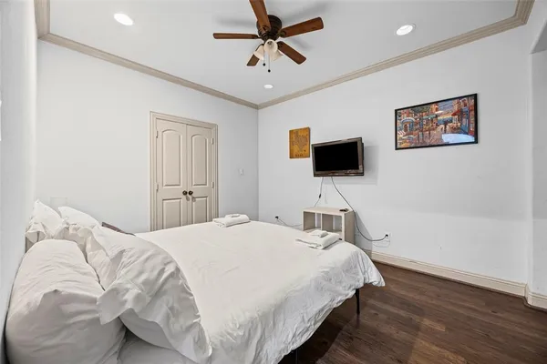 a bed room with a bed and a window
