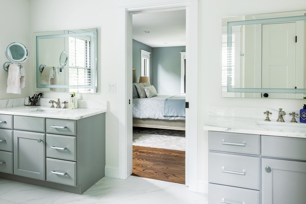 46 Tamworth Road Newton, MA 02468 - Photo 7 of 12 a en suite bathroom with a double vanity sink a mirror and a