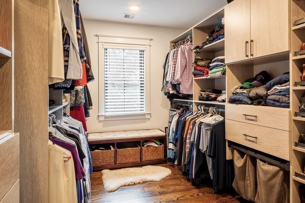 46 Tamworth Road Newton, MA 02468 - Photo 8 of 12 a view of walk in closet with clothes and shoes