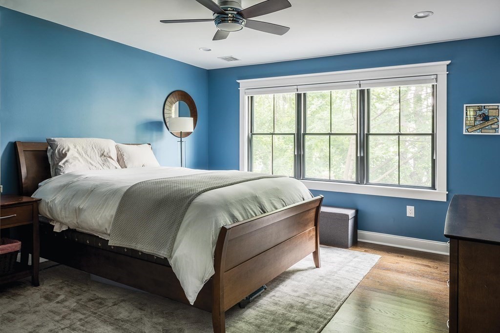 46 Tamworth Road Newton, MA 02468 - Photo 9 of 12 a bedroom with a large bed and a window