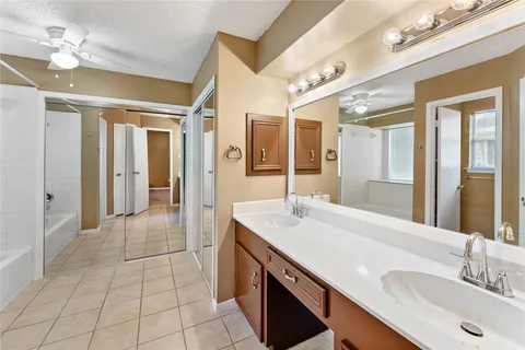 a bathroom with a bathtub and toilet
