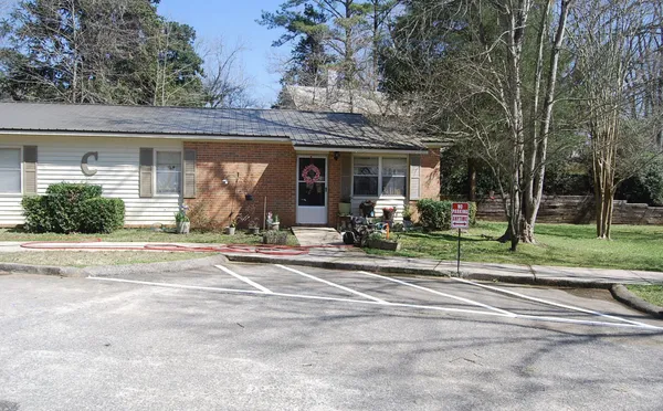 front view of a house with a patio