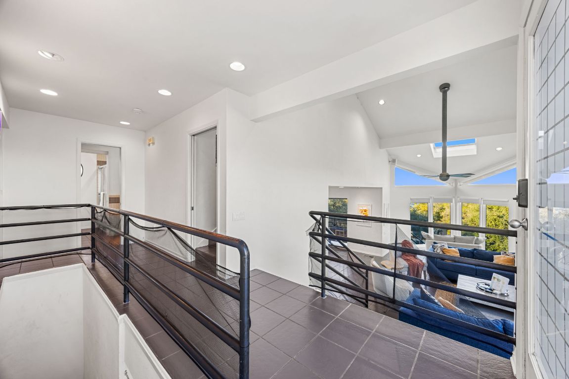 723 Coventry Road Spicewood, TX 78669 - Photo 11 of 40 a view of hallway with furniture