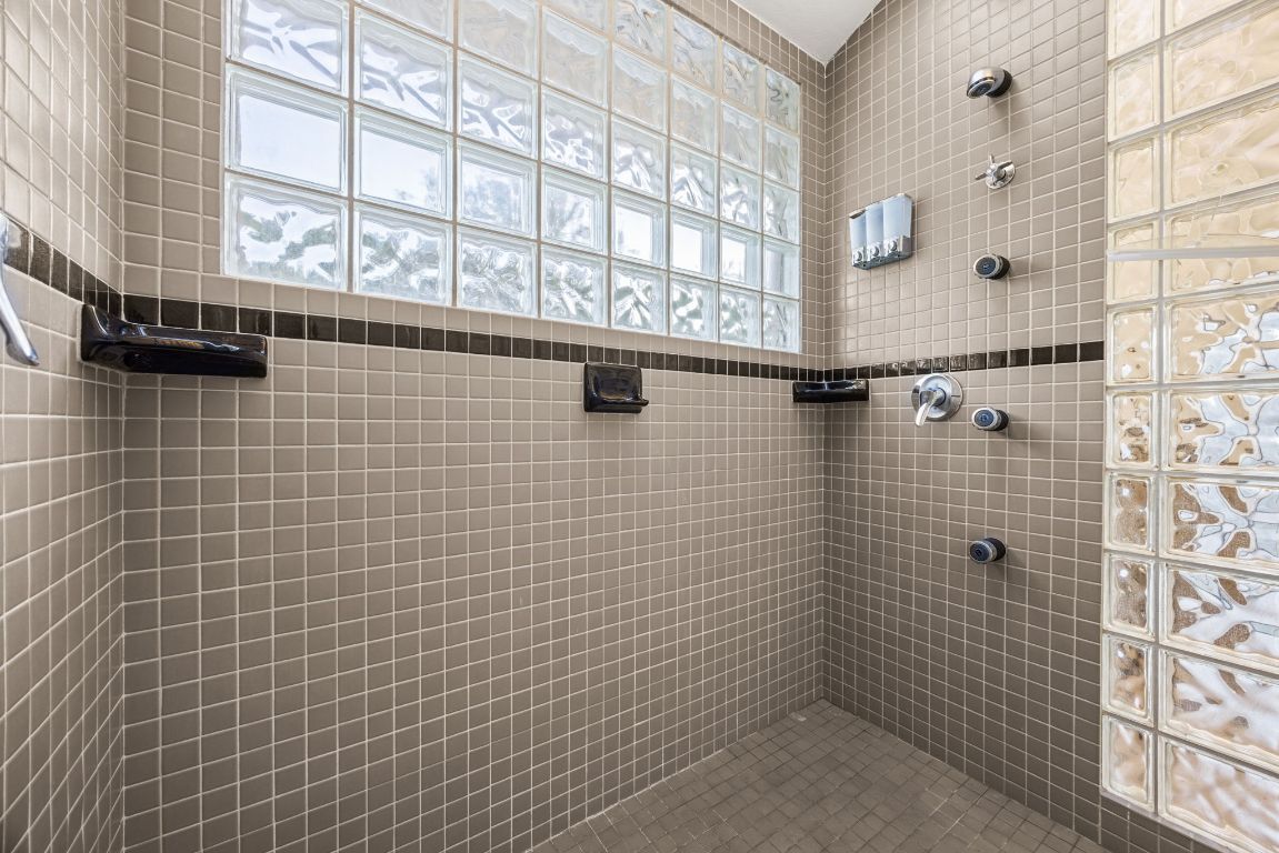 723 Coventry Road Spicewood, TX 78669 - Photo 16 of 40 a bathroom with a shower