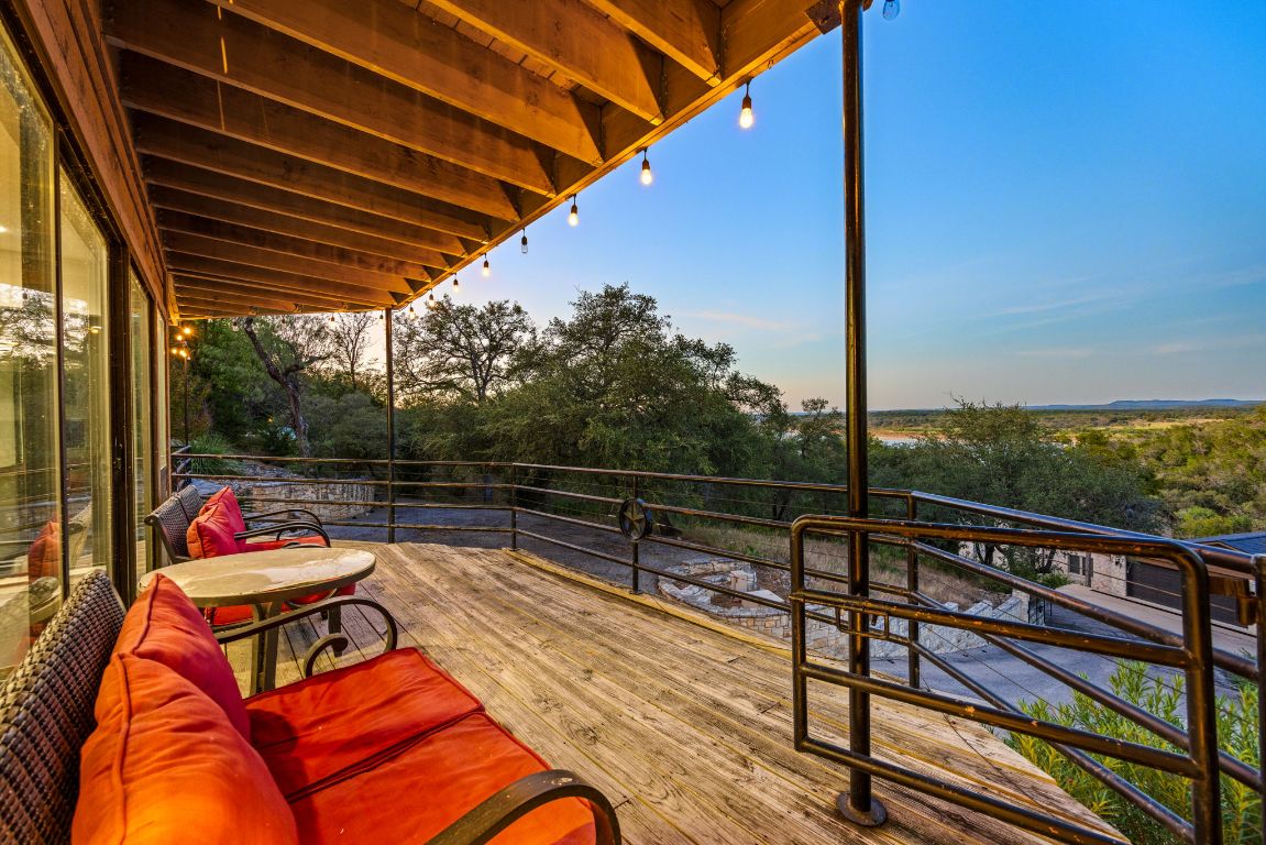 723 Coventry Road Spicewood, TX 78669 - Photo 29 of 40 a view of sitting area with furniture and wooden deck