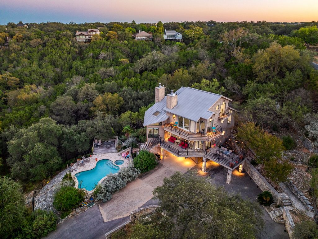 723 Coventry Road Spicewood, TX 78669 - Photo 38 of 40 an aerial view of a house with a garden