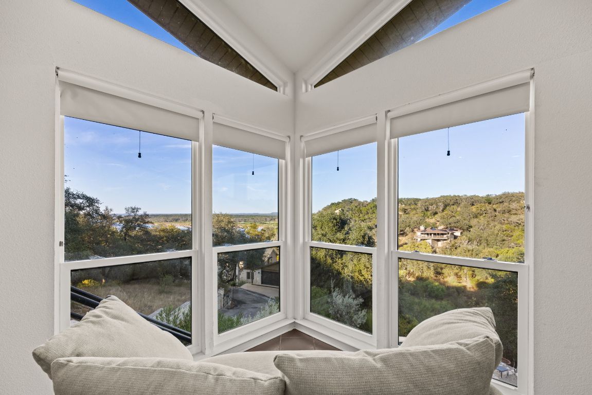 723 Coventry Road Spicewood, TX 78669 - Photo 5 of 40 a view of a room with a large window
