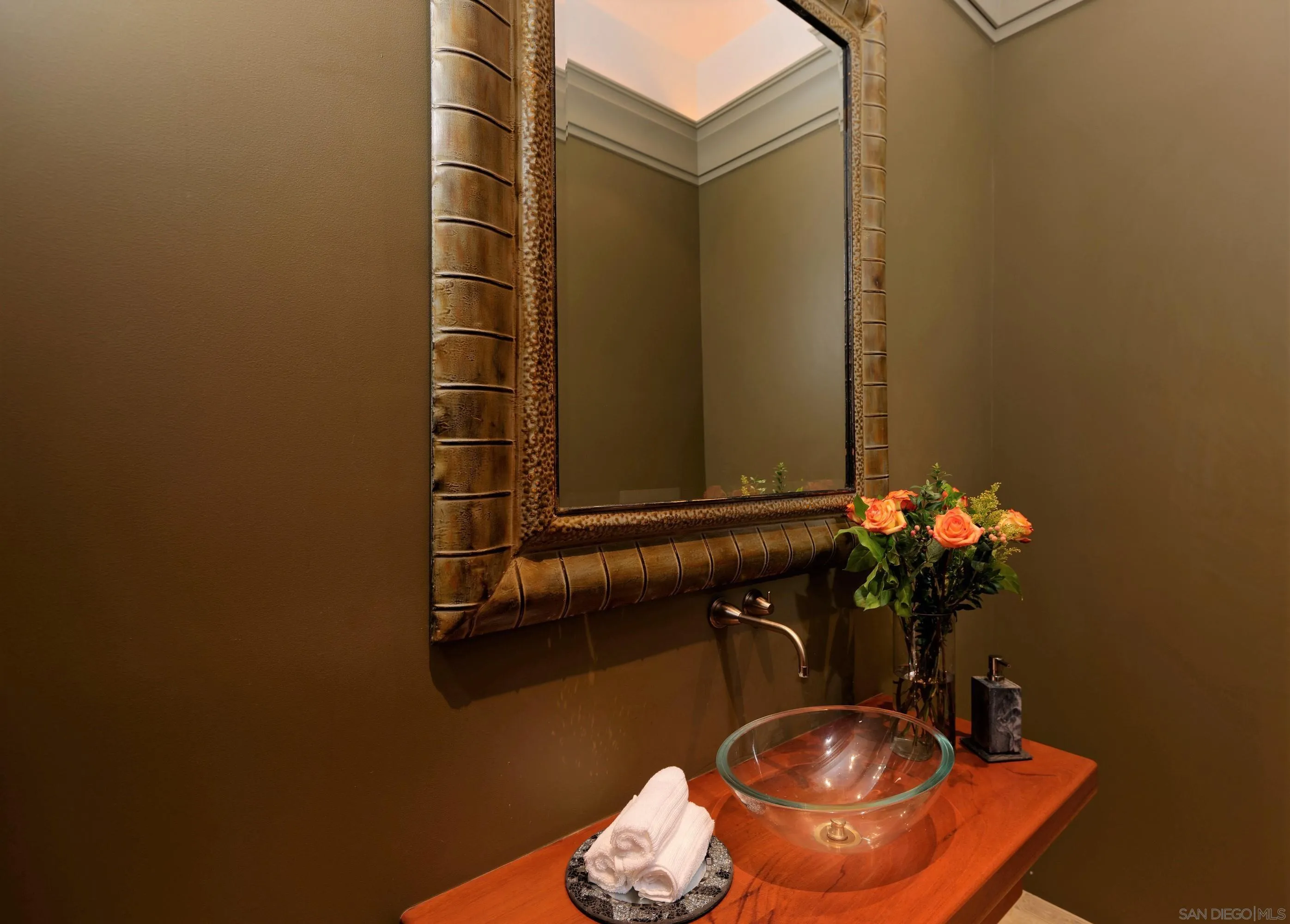 2116 Balboa Avenue Del Mar, CA 92014 - Photo 16 of 33 a bathroom with a sink and a mirror