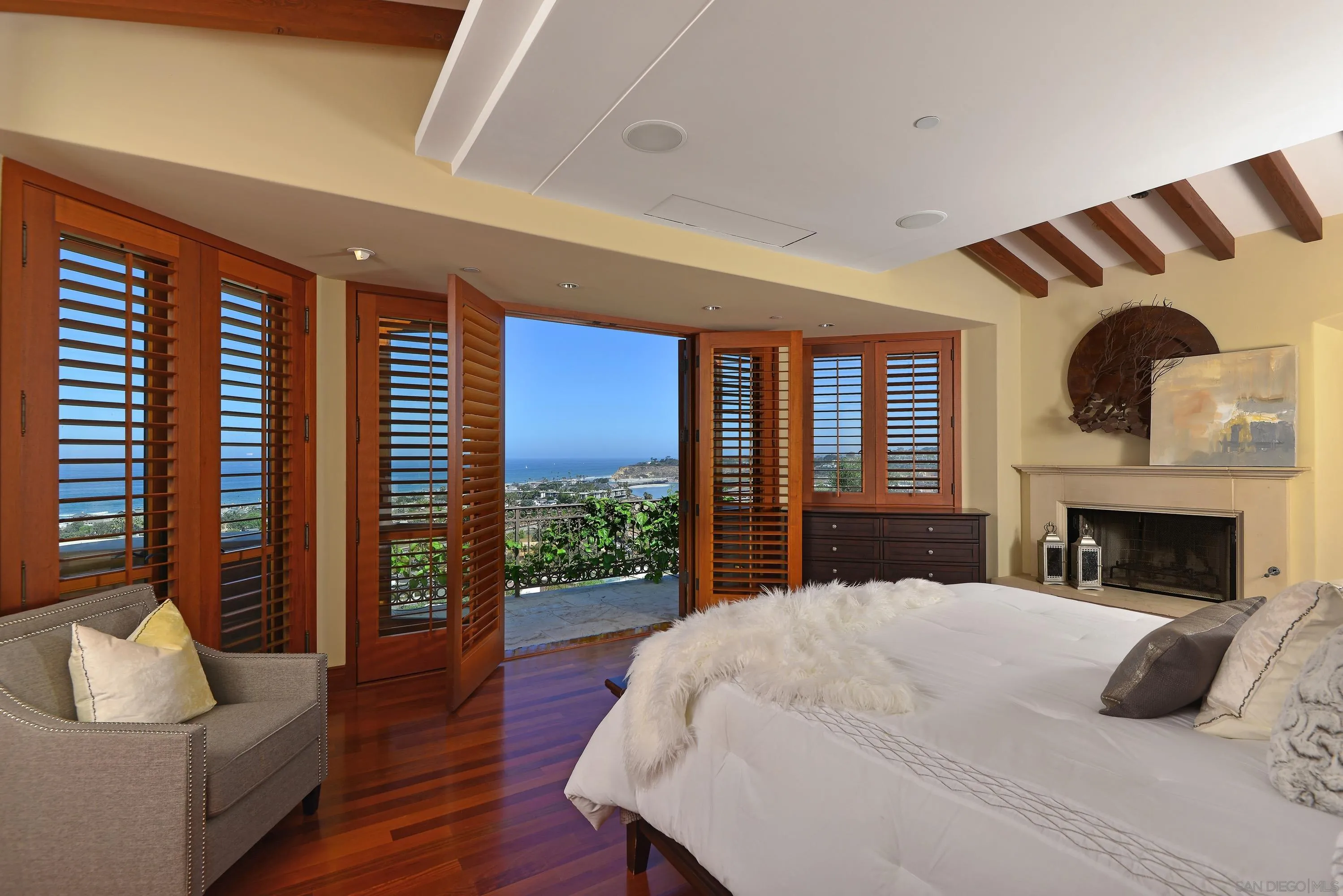 2116 Balboa Avenue Del Mar, CA 92014 - Photo 17 of 33 a large bedroom with a bed and a couch