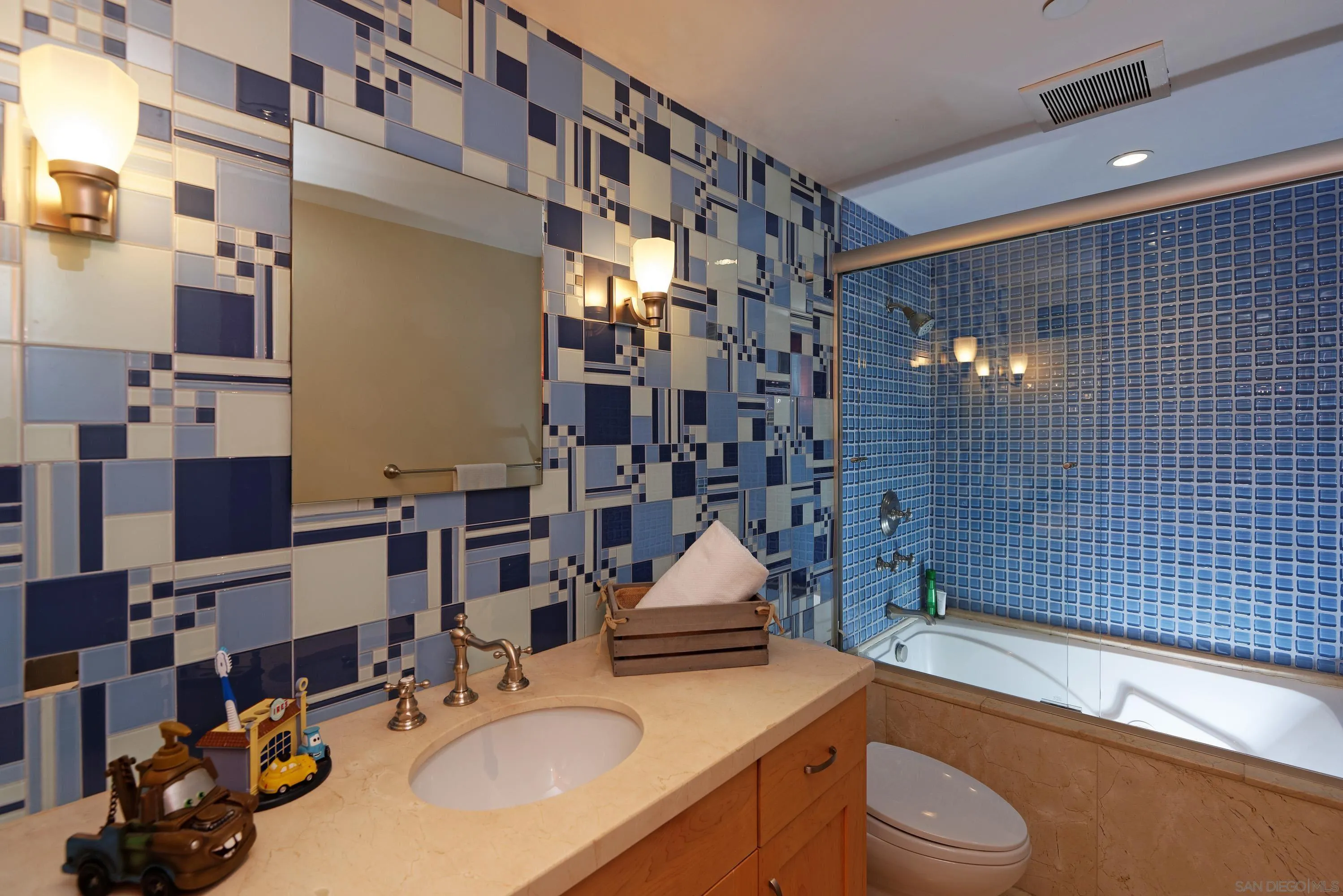 2116 Balboa Avenue Del Mar, CA 92014 - Photo 24 of 33 a bathroom with a sink toilet and shower