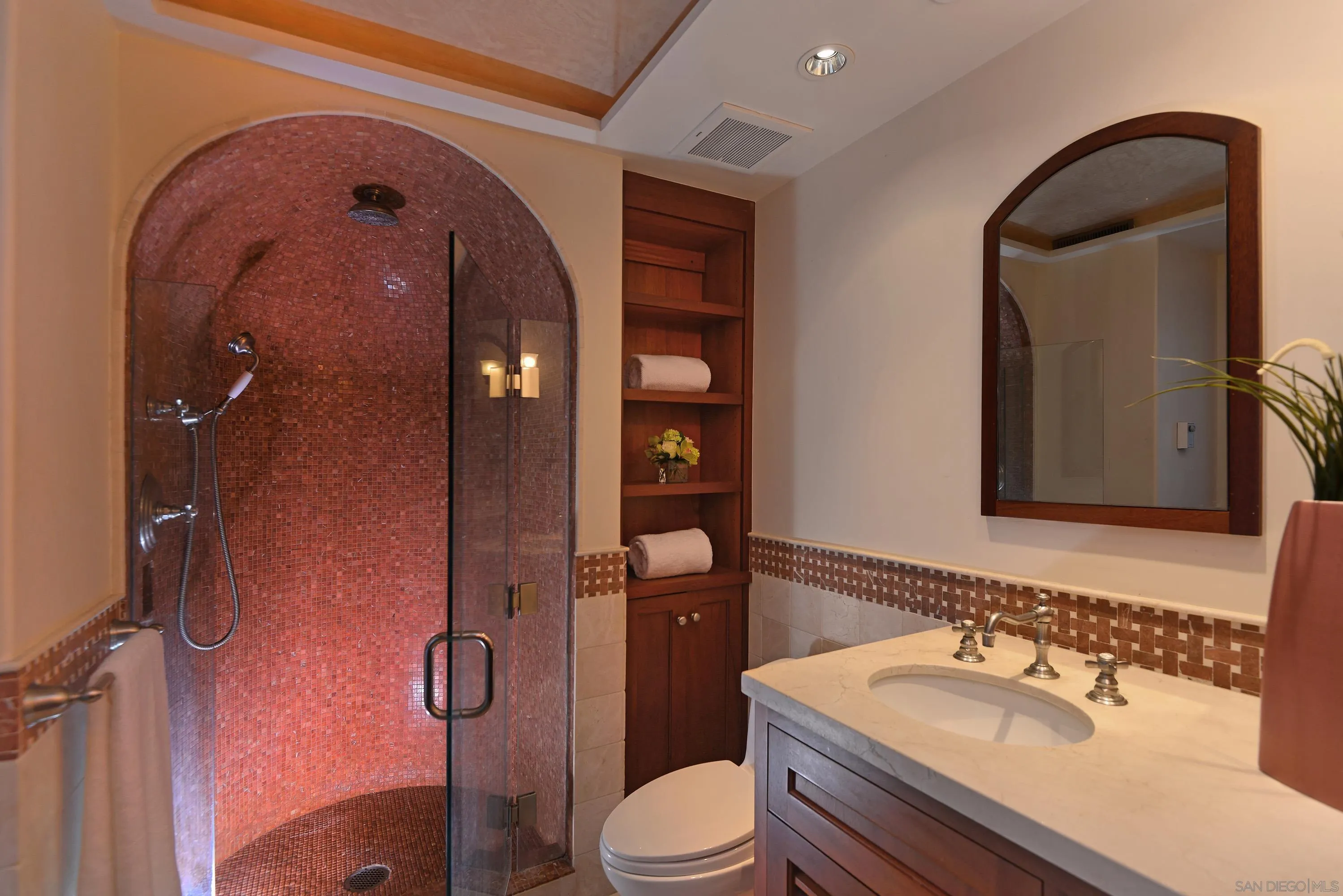 2116 Balboa Avenue Del Mar, CA 92014 - Photo 28 of 33 a bathroom with a sink a toilet and shower