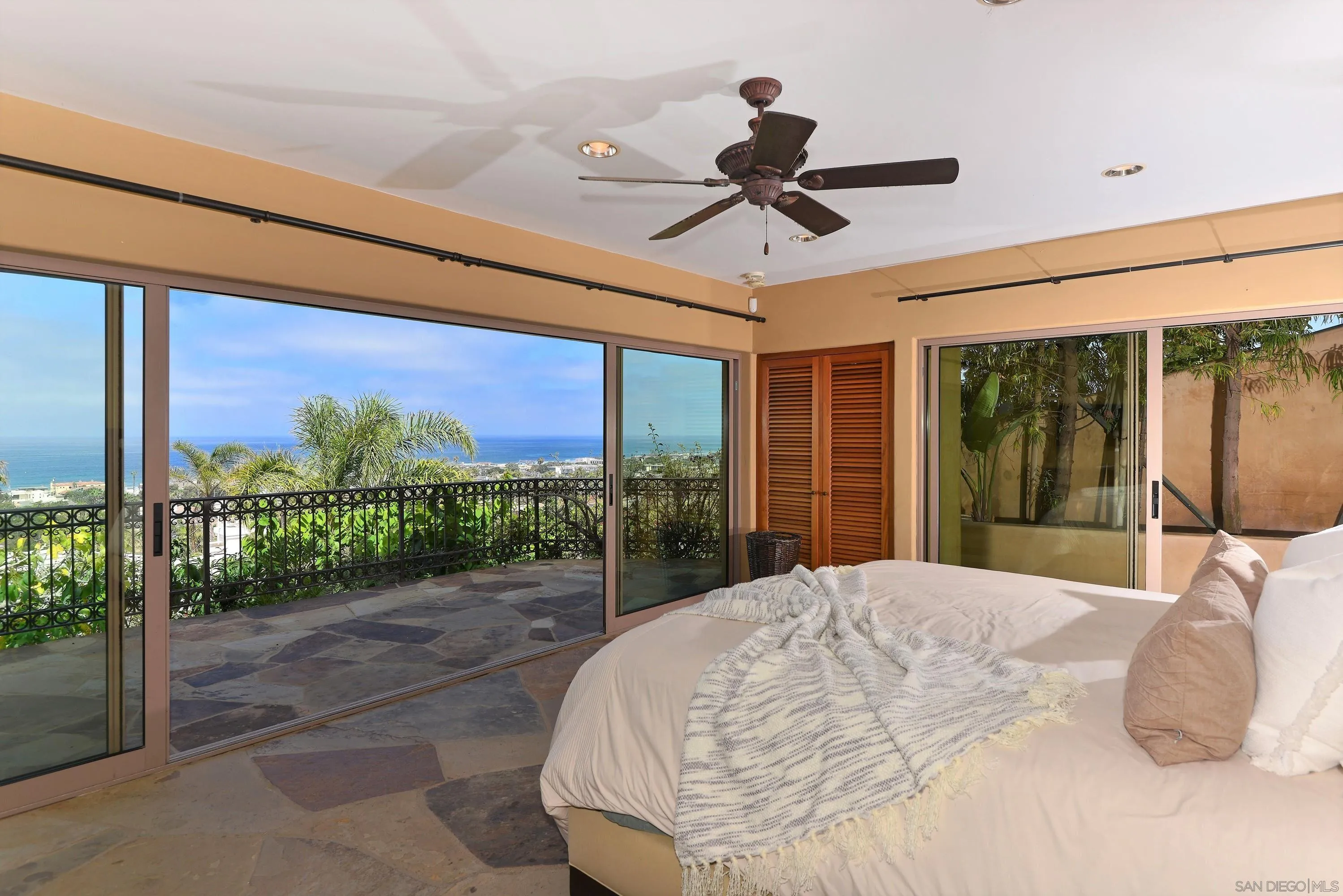 2116 Balboa Avenue Del Mar, CA 92014 - Photo 31 of 33 a bed sitting in a bedroom next to a large window