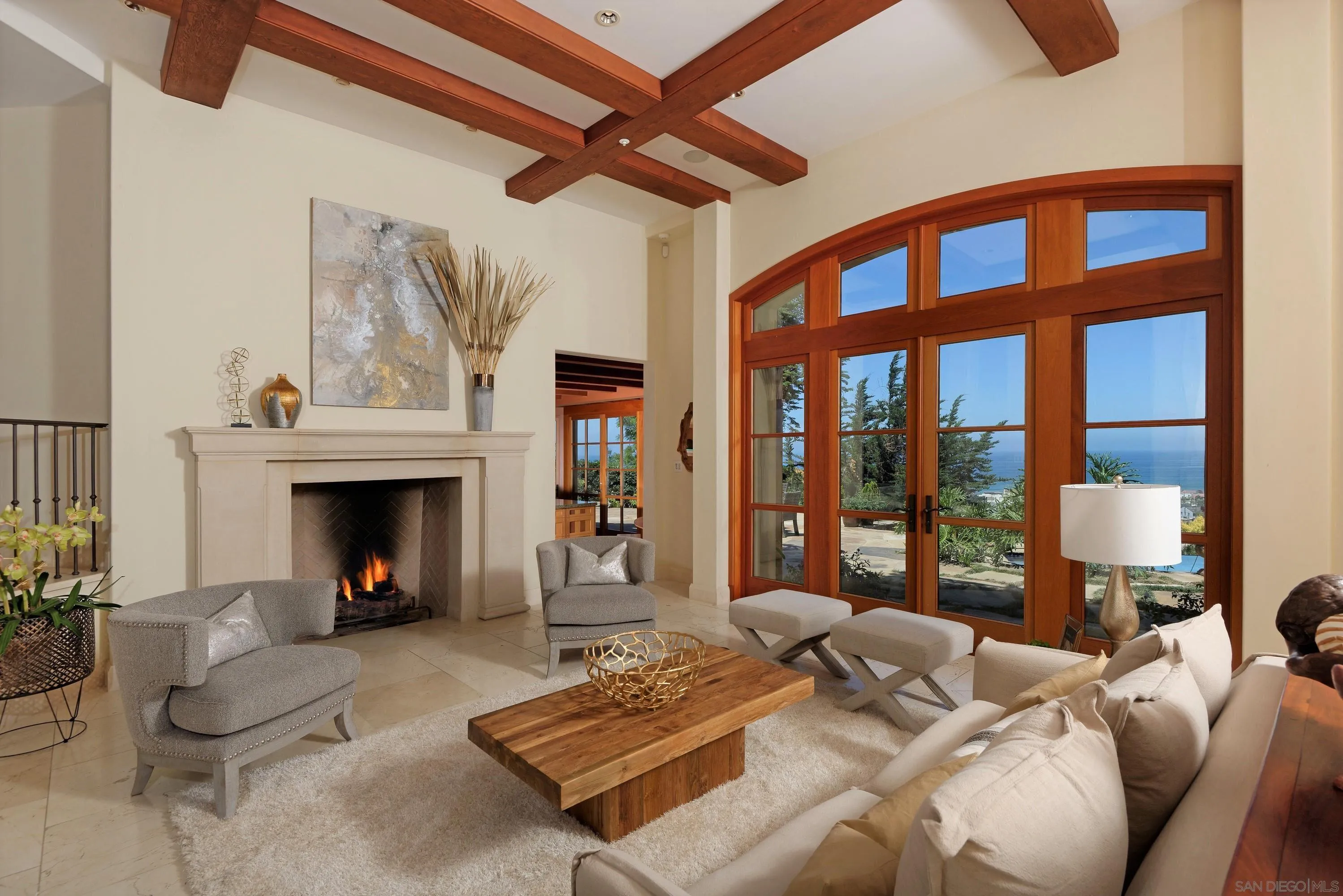 2116 Balboa Avenue Del Mar, CA 92014 - Photo 7 of 33 a living room with furniture a fireplace and a large window