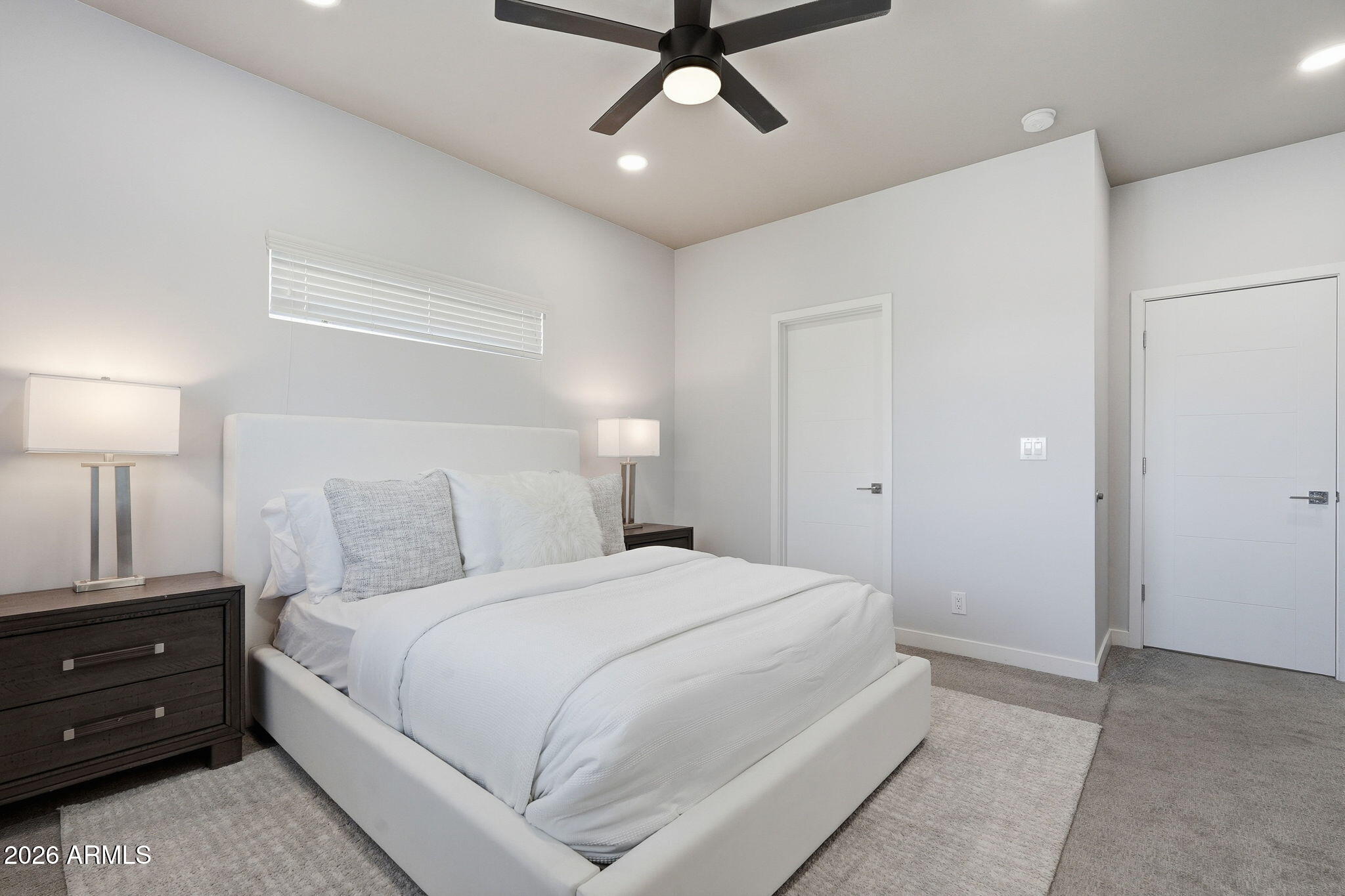 2727 East Thomas Road, Unit 5 Phoenix, AZ 85016 - Photo 25 of 41 a bedroom with a bed and a night stand