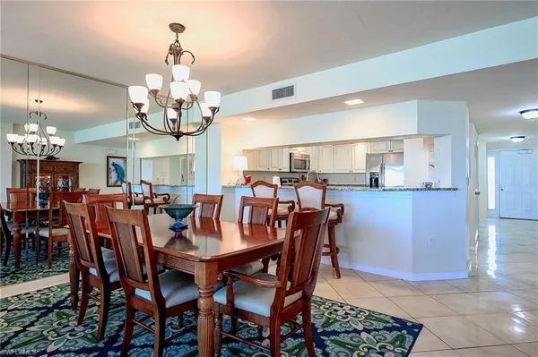 a view of a dining room and livingroom