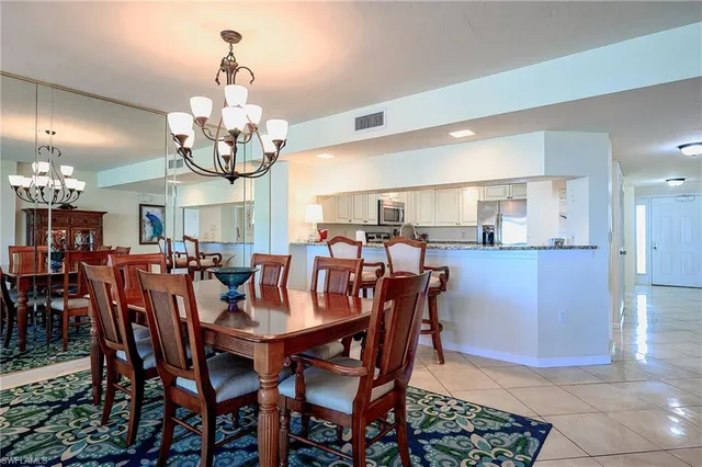 a view of a dining room and livingroom